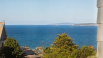 Gaze out at the turquoise waters of the Bay with a glass of something cold in hand.