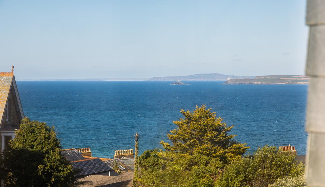 Gaze out at the turquoise waters of the Bay with a glass of something cold in hand.