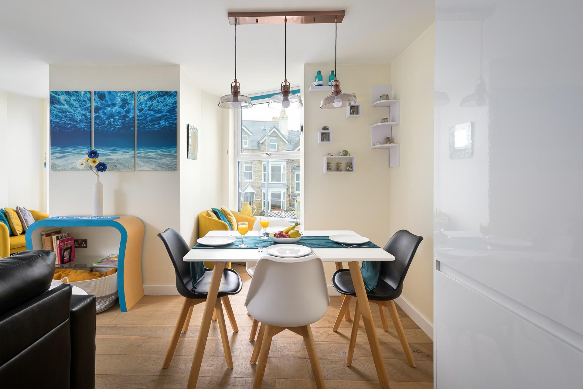 Get some fresh ingredients in town and cook a tasty meal.