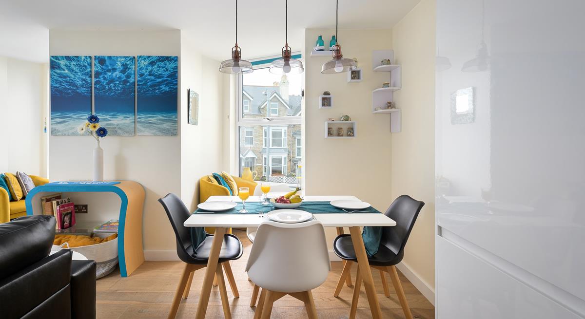 Get some fresh ingredients in town and cook a tasty meal.