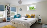 Bedroom 1 has a spacious king size bed to tuck into each evening for a relaxing night's sleep. - Thumbnail Image