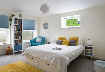 Bedroom 1 has a spacious king size bed to tuck into each evening for a relaxing night's sleep.