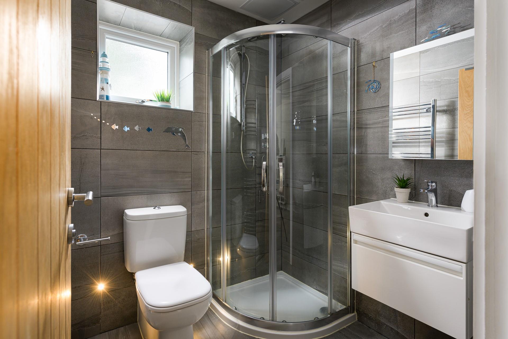 Wash off sandy toes in the shower after a day on Porthminster beach.