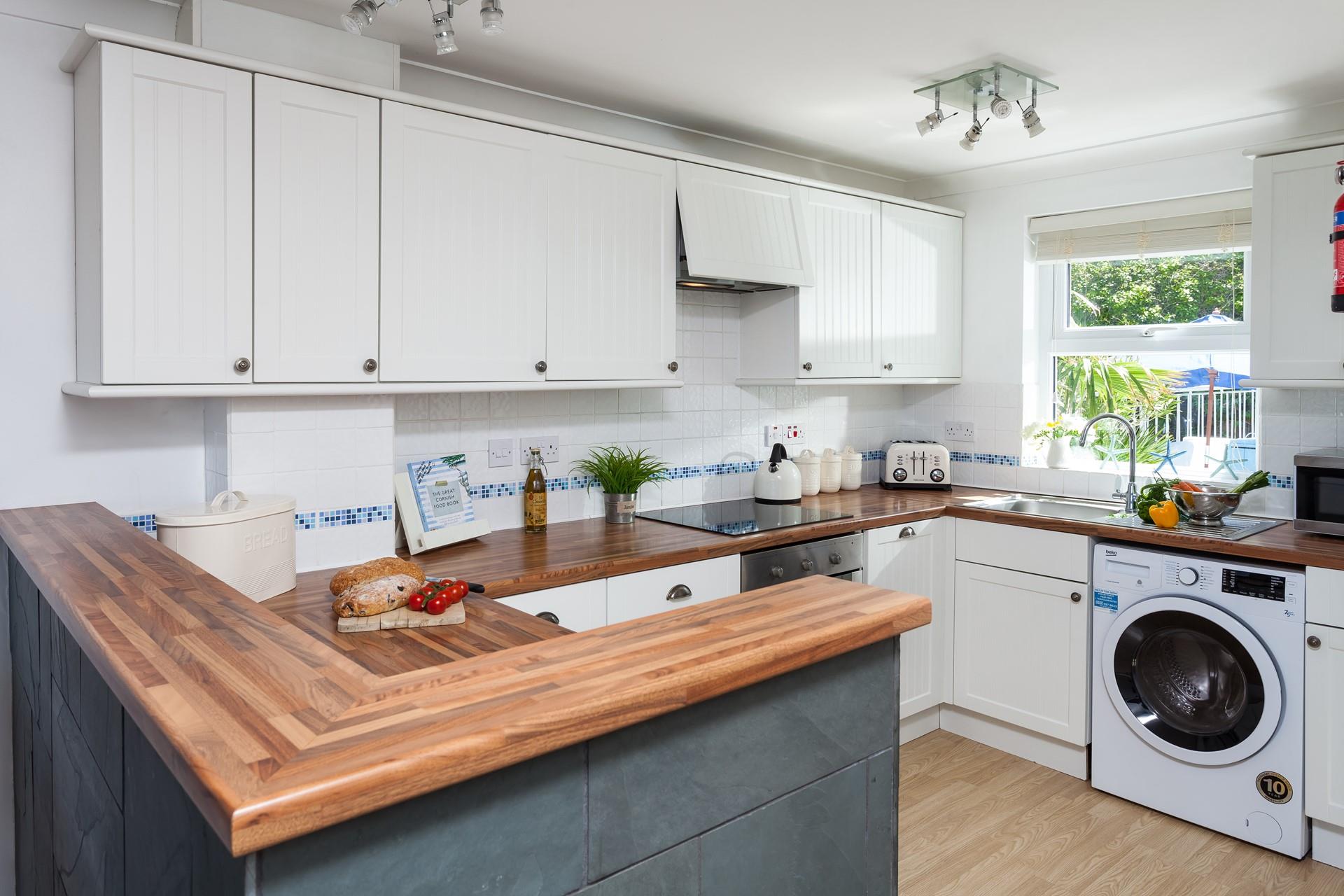 Use local produce to rustle up some fine cuisine in this modern kitchen.