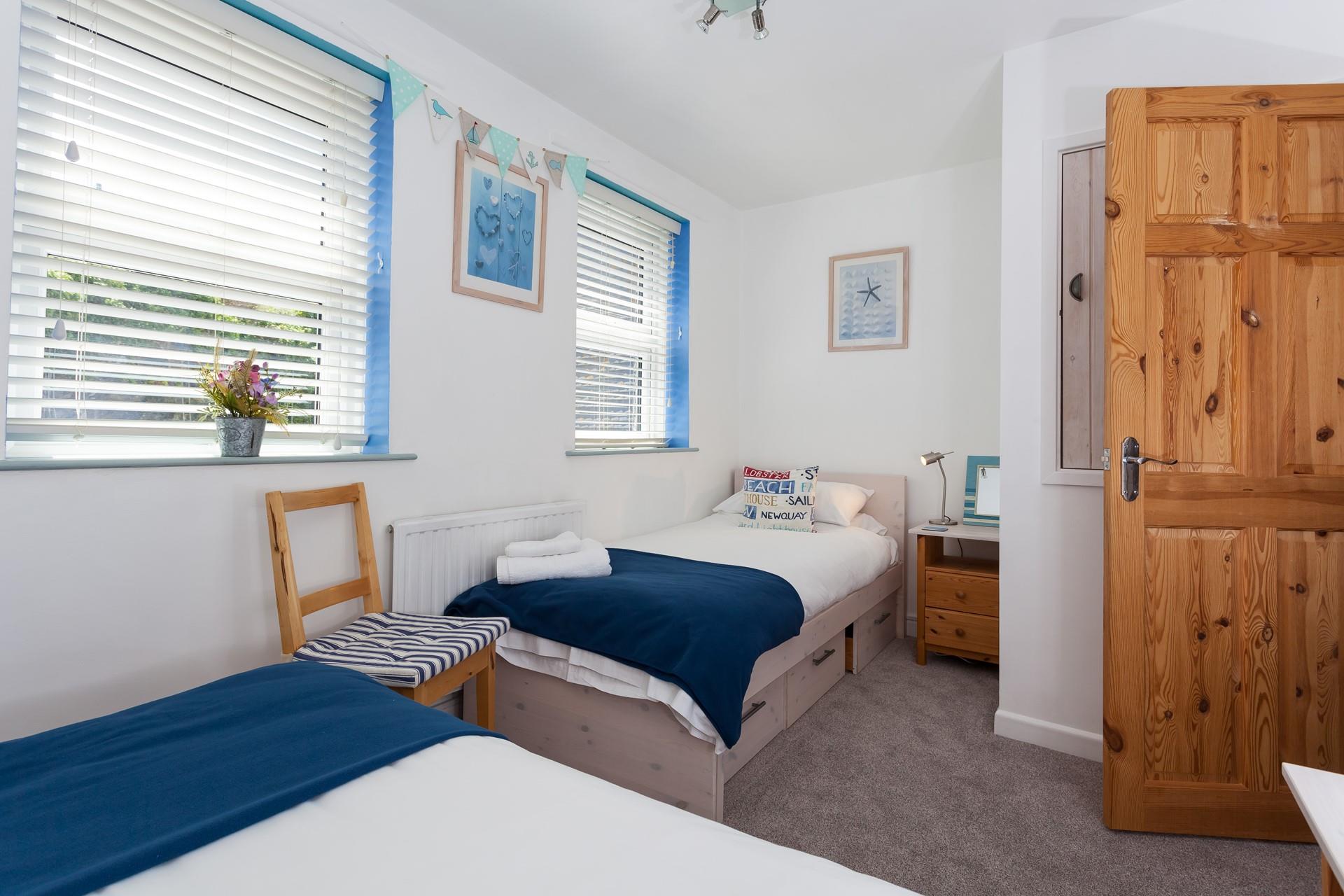 There is a good-sized mirror available in the twin bedroom, handy for checking your summer outfit.