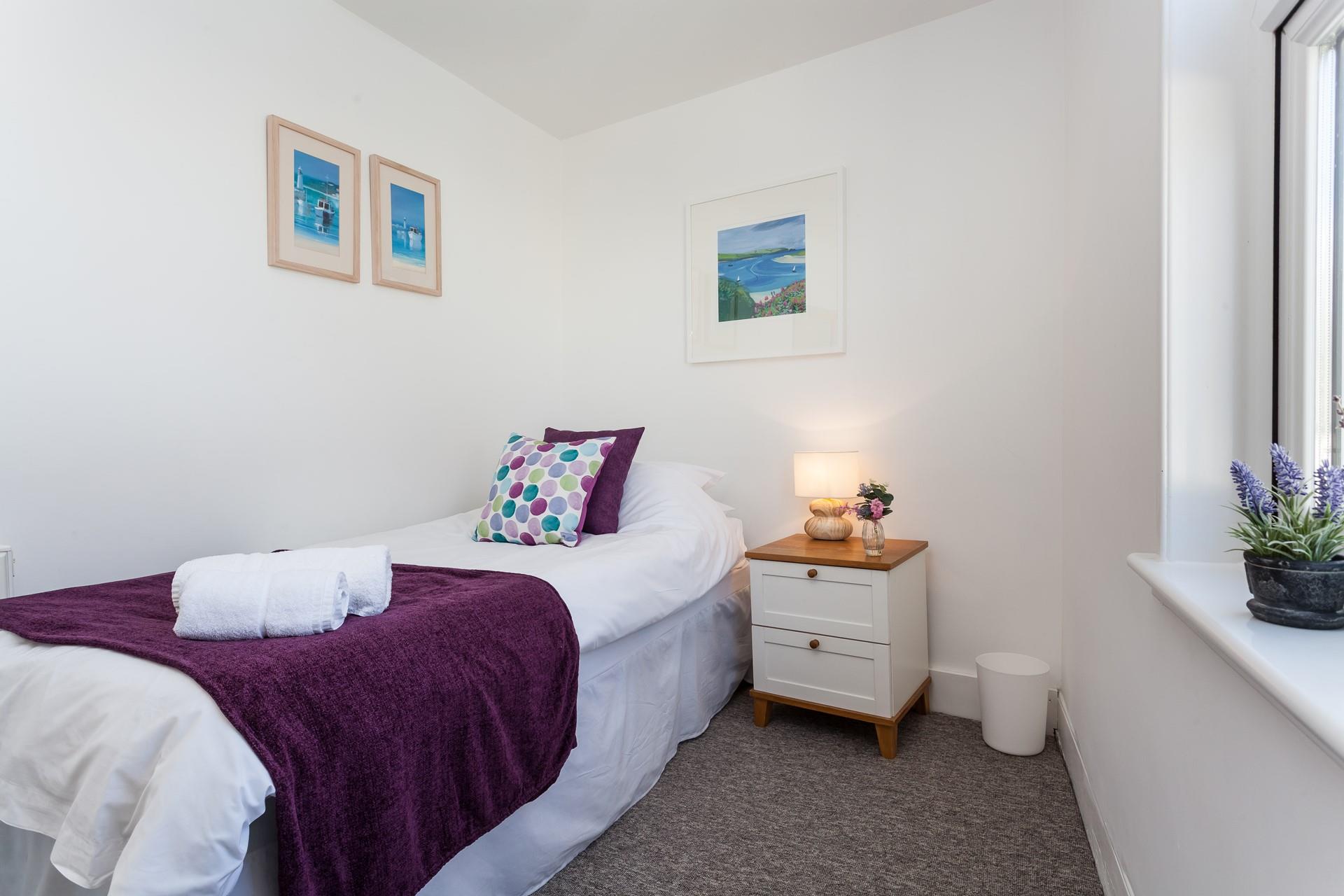 The single bed in bedroom 2 is perfect for either a child or an adult.