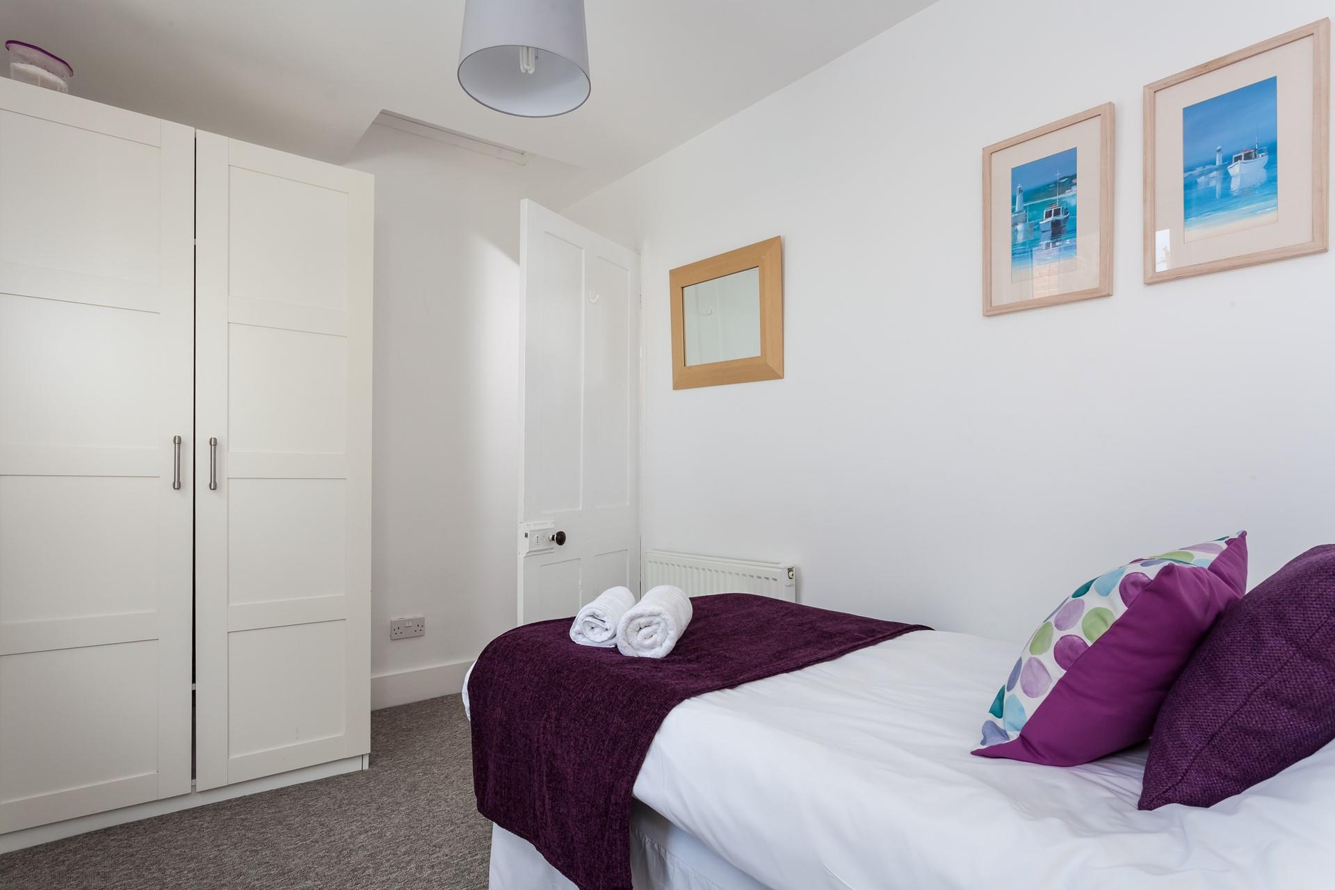 The wardrobe offers plenty of storage for your holiday best! 