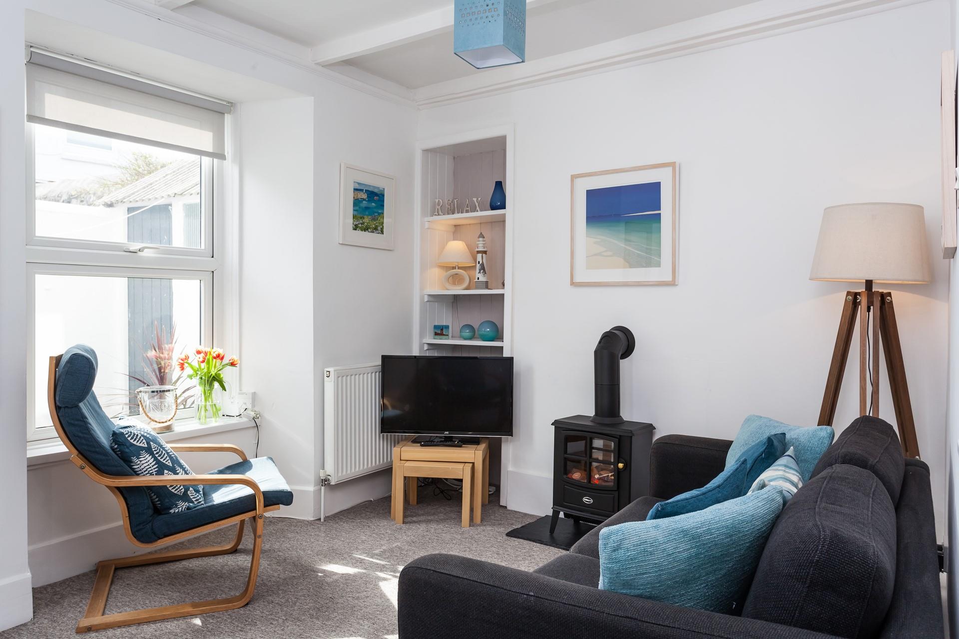 Thoughtfully designed, the sitting room has been transformed into a cosy haven.