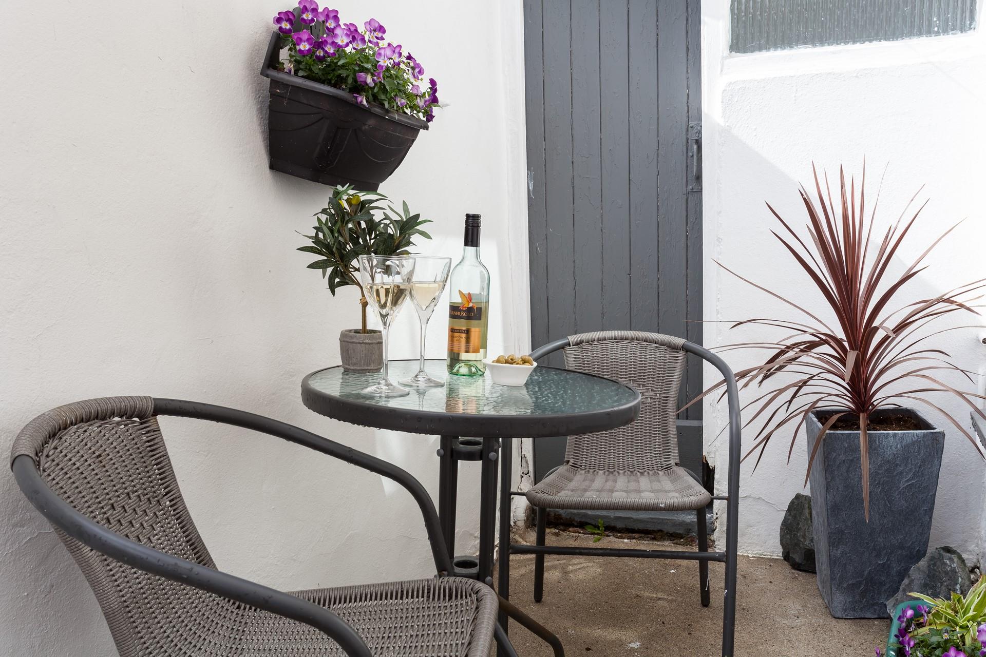 The private little courtyard area is the perfect space to dine al fresco whilst soaking up the last of the sun.