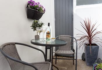 The private little courtyard area is the perfect space to dine al fresco whilst soaking up the last of the sun.