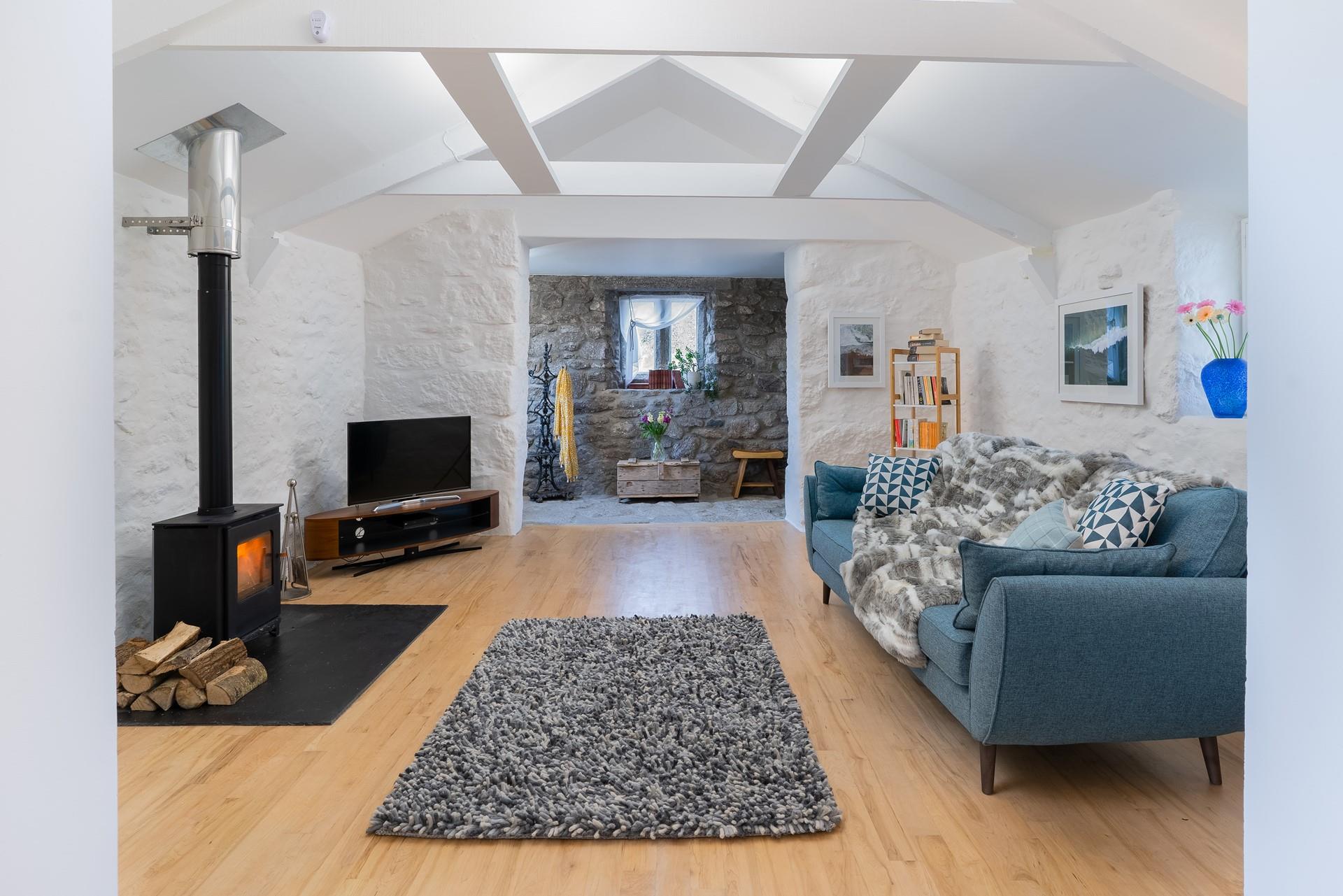 Snuggle up in front of the woodburner after a blustery walk in the countryside.