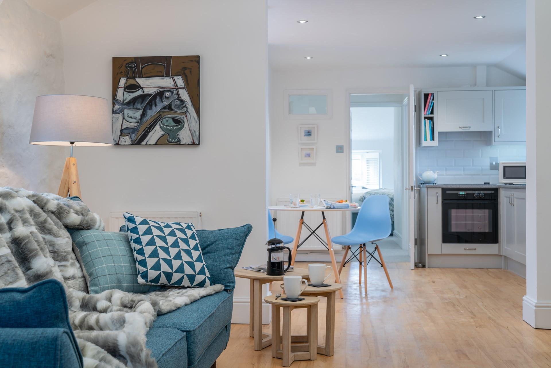 Shades of blue reflect the Cornish coastal surroundings.