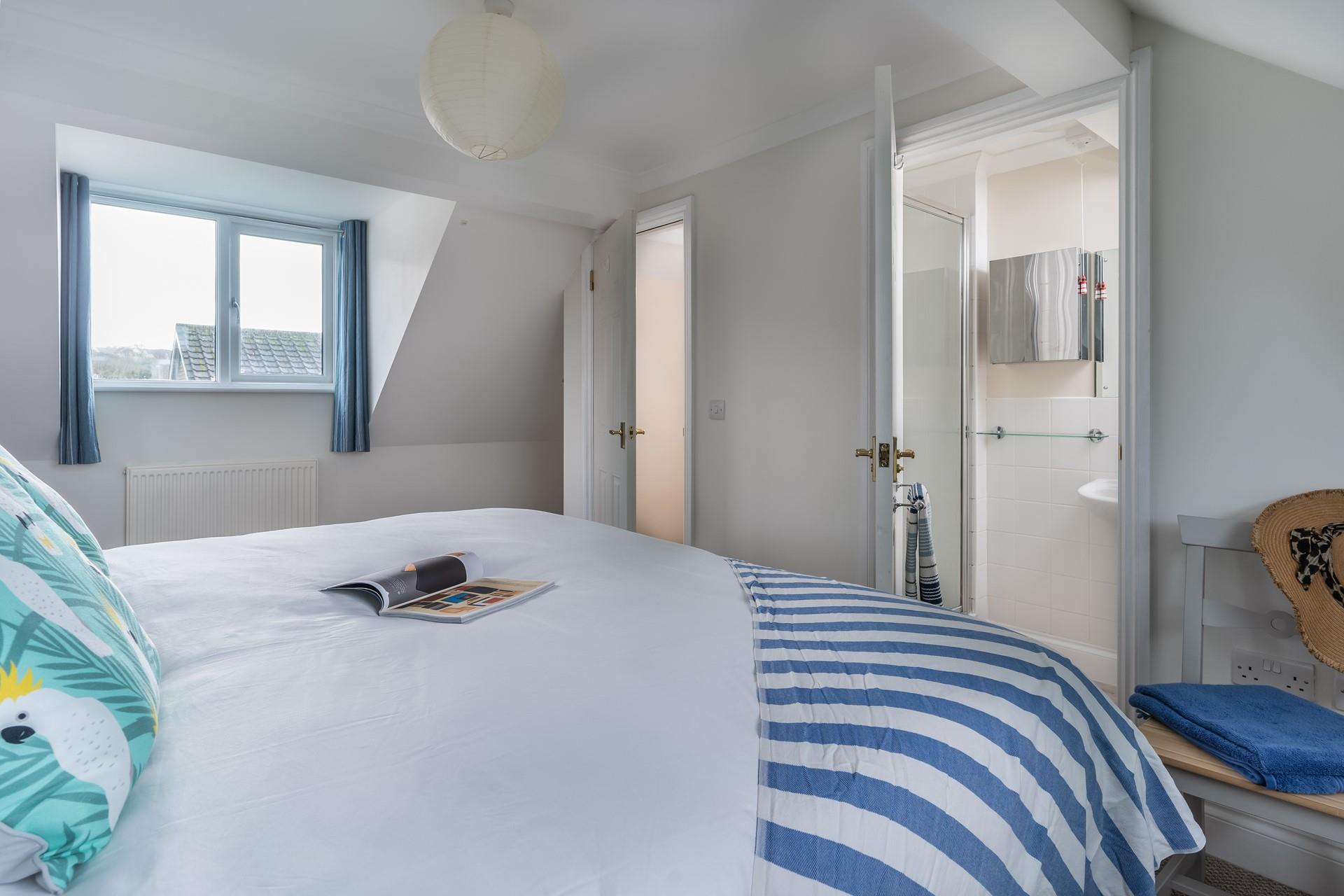 The spacious super king size bed provides the most relaxing night's sleep.