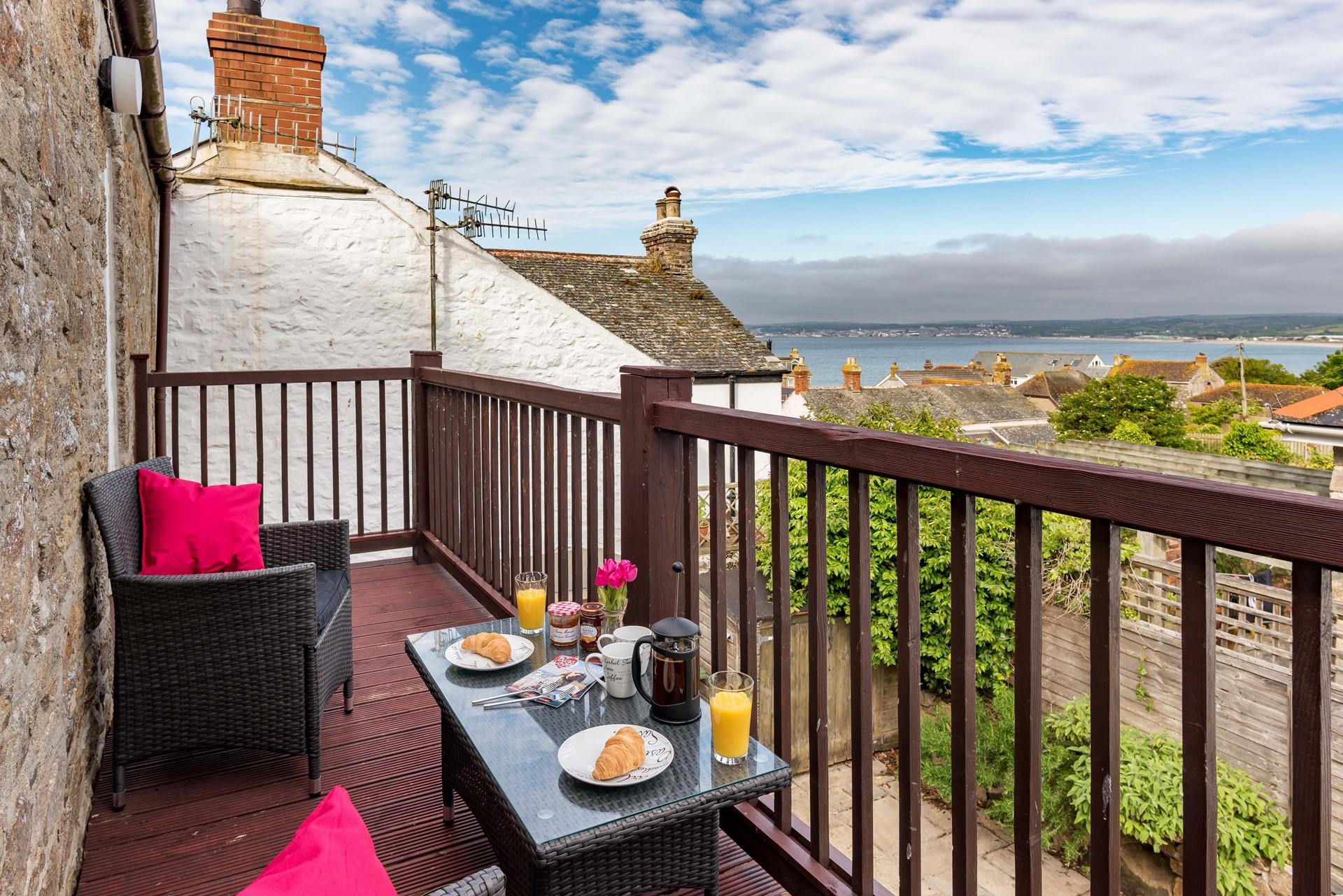 Enjoy calming coastal views from the balcony.
