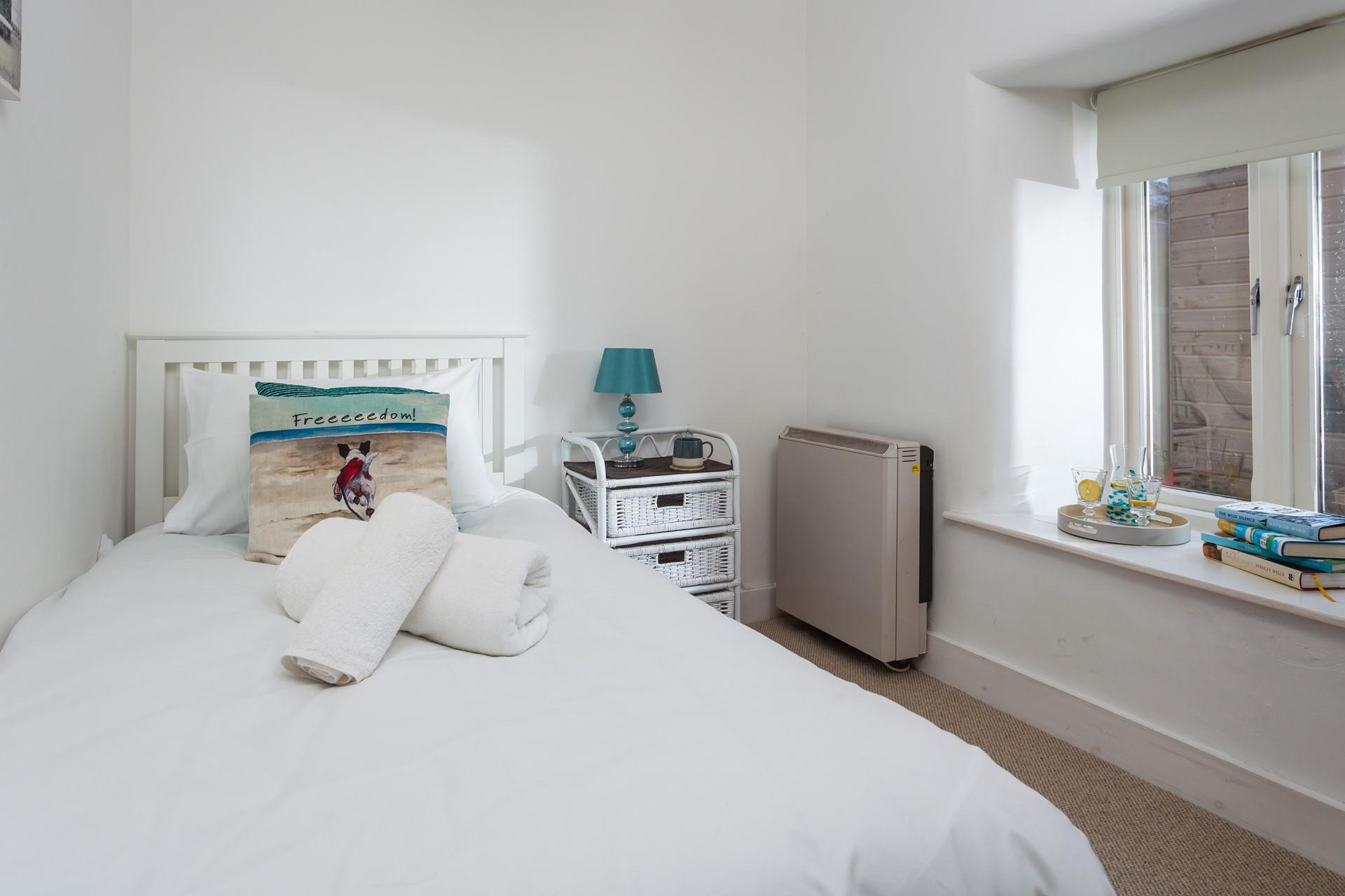 Single bedroom for flexible sleeping.