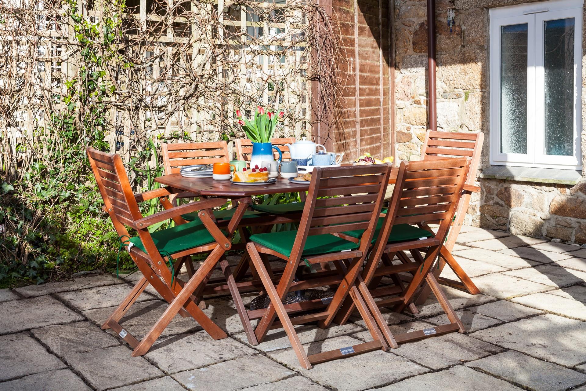 After a meal at a Cornish pub come back to relax in your garden with a cold drink in hand.