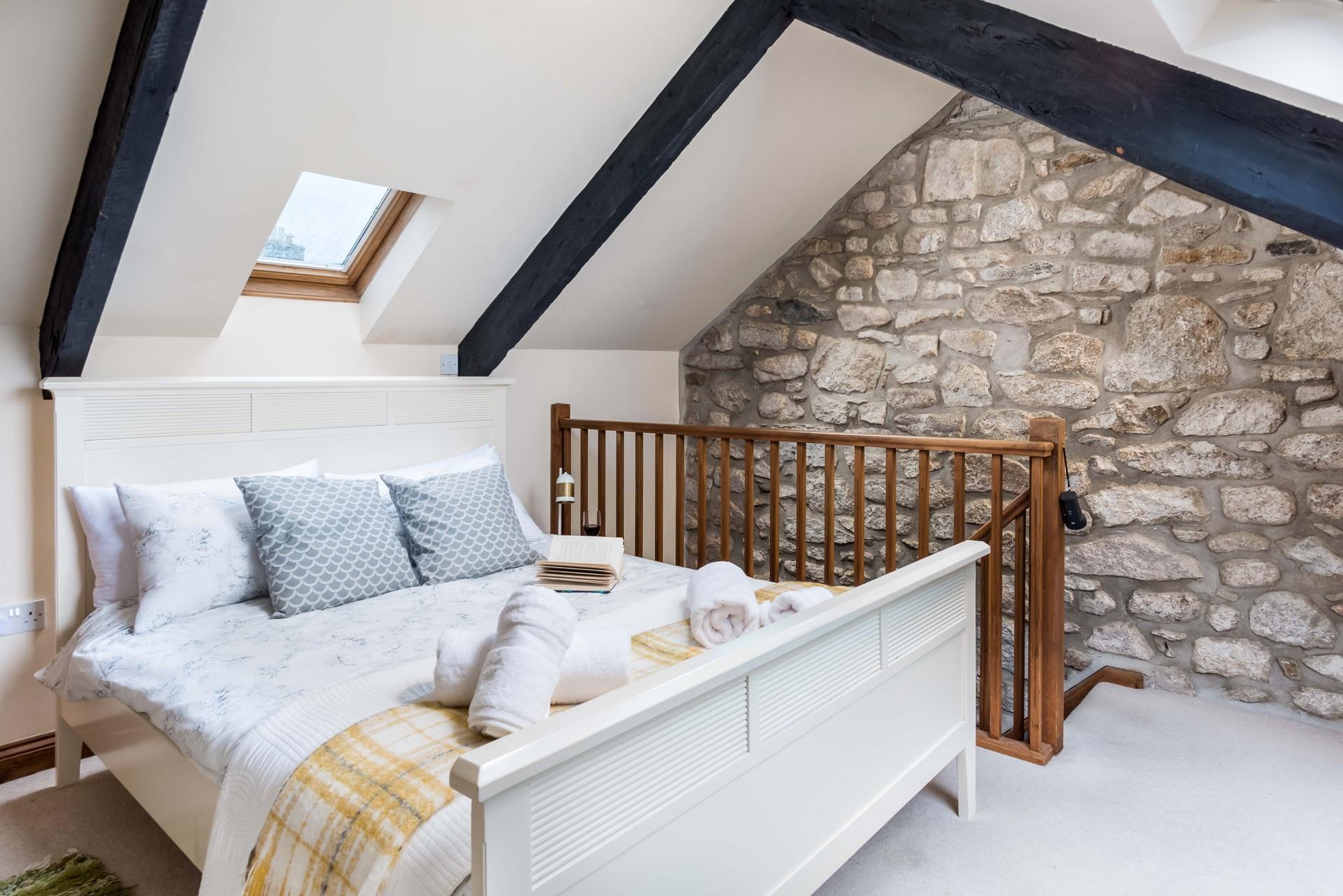 Sink into the soft sheets of the double bed for a dreamy night's sleep.