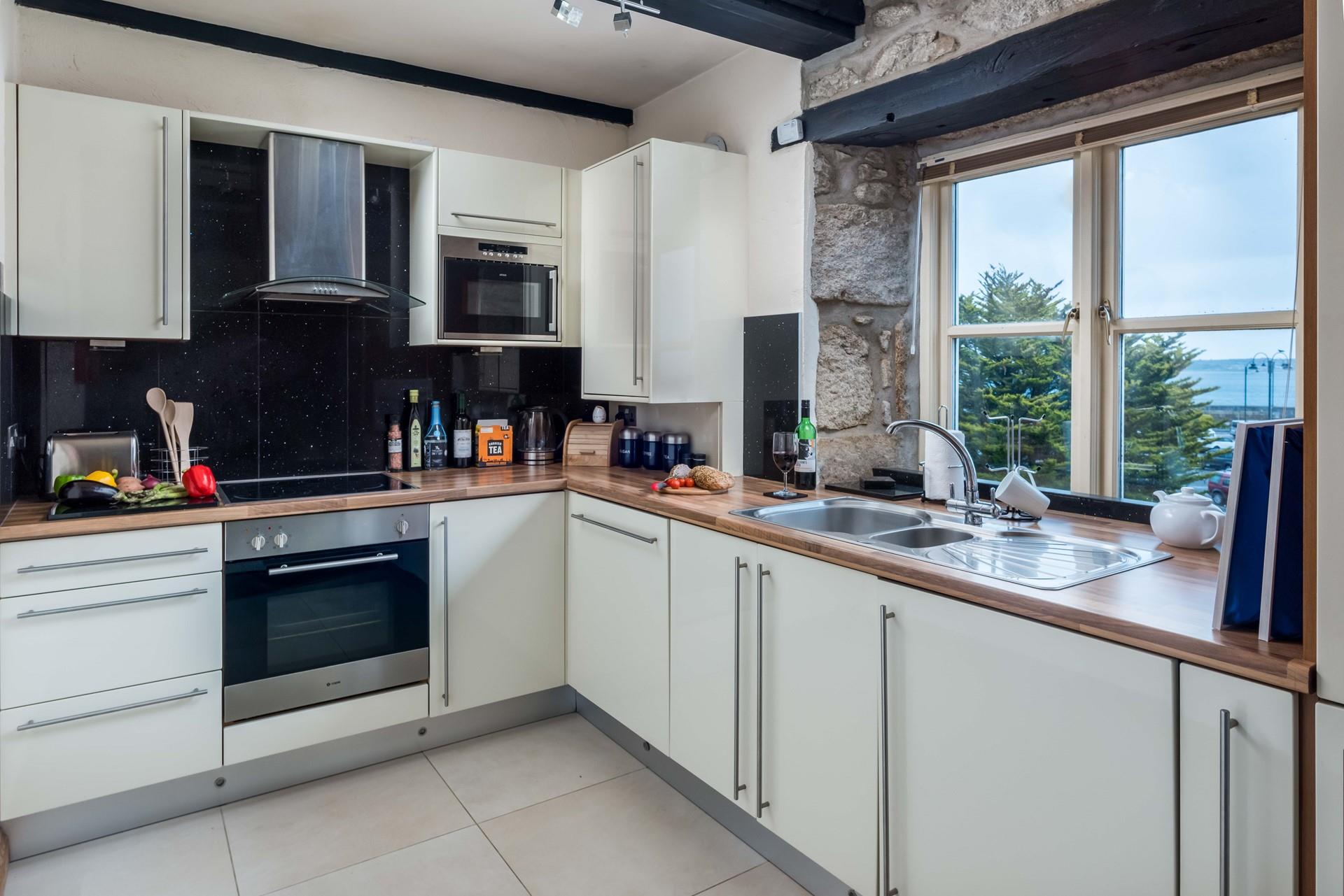 Buy some local ingredients and cook up a storm.