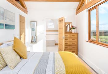 The bedroom overlooks the rolling countryside which provides the perfect early morning view.