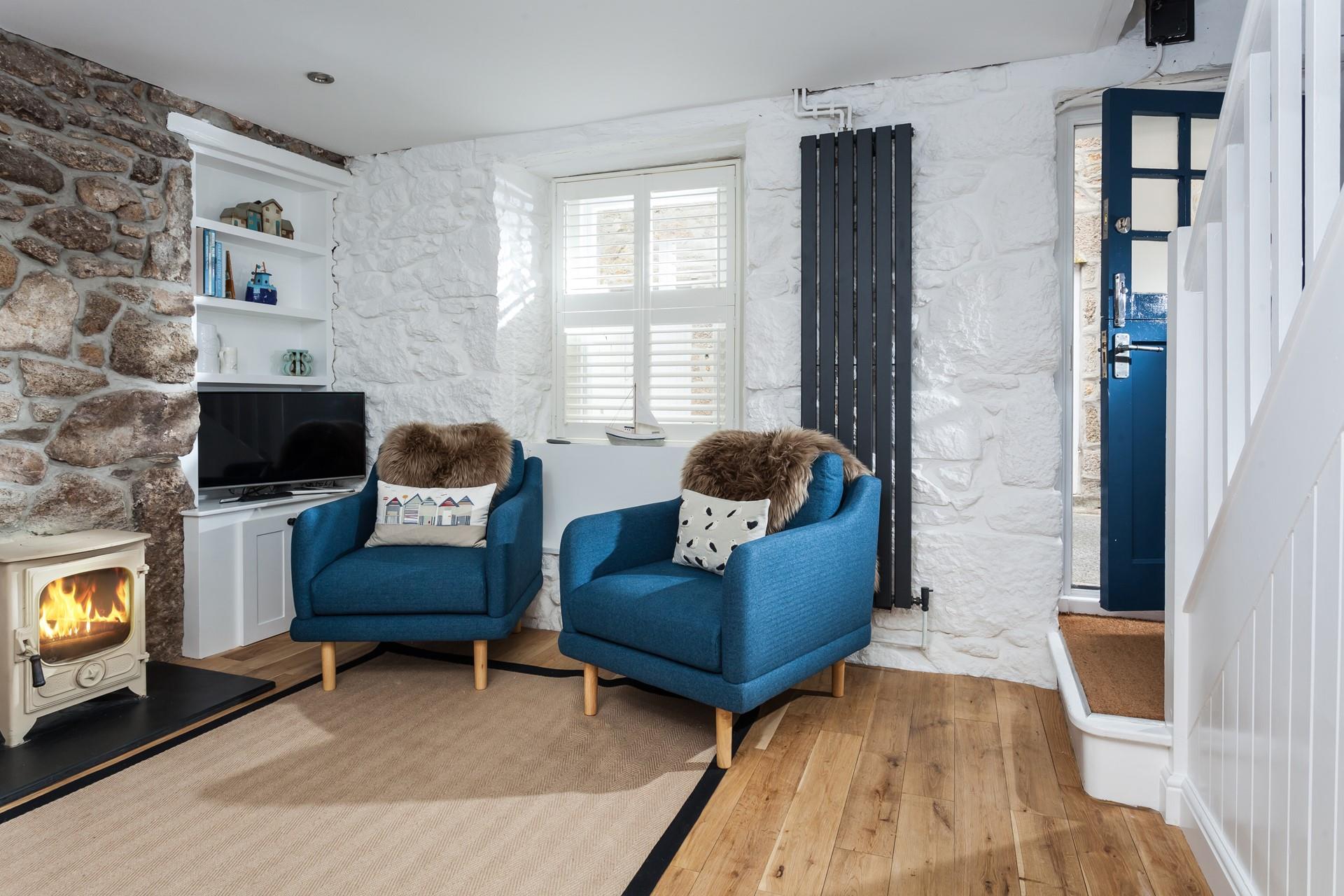 Snuggle up in the sitting room in front of a roaring woodburner.