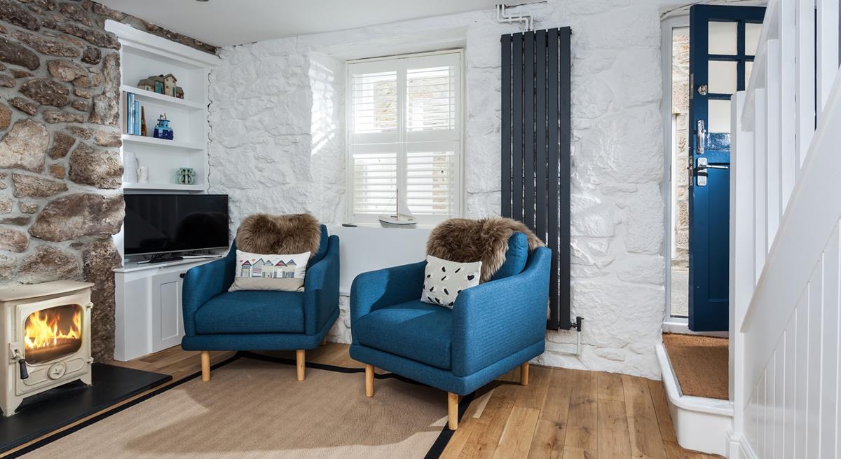 Snuggle up in the sitting room in front of a roaring woodburner.