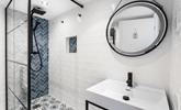 Wash off your sandy toes in the modern and light family shower room. - Thumbnail Image