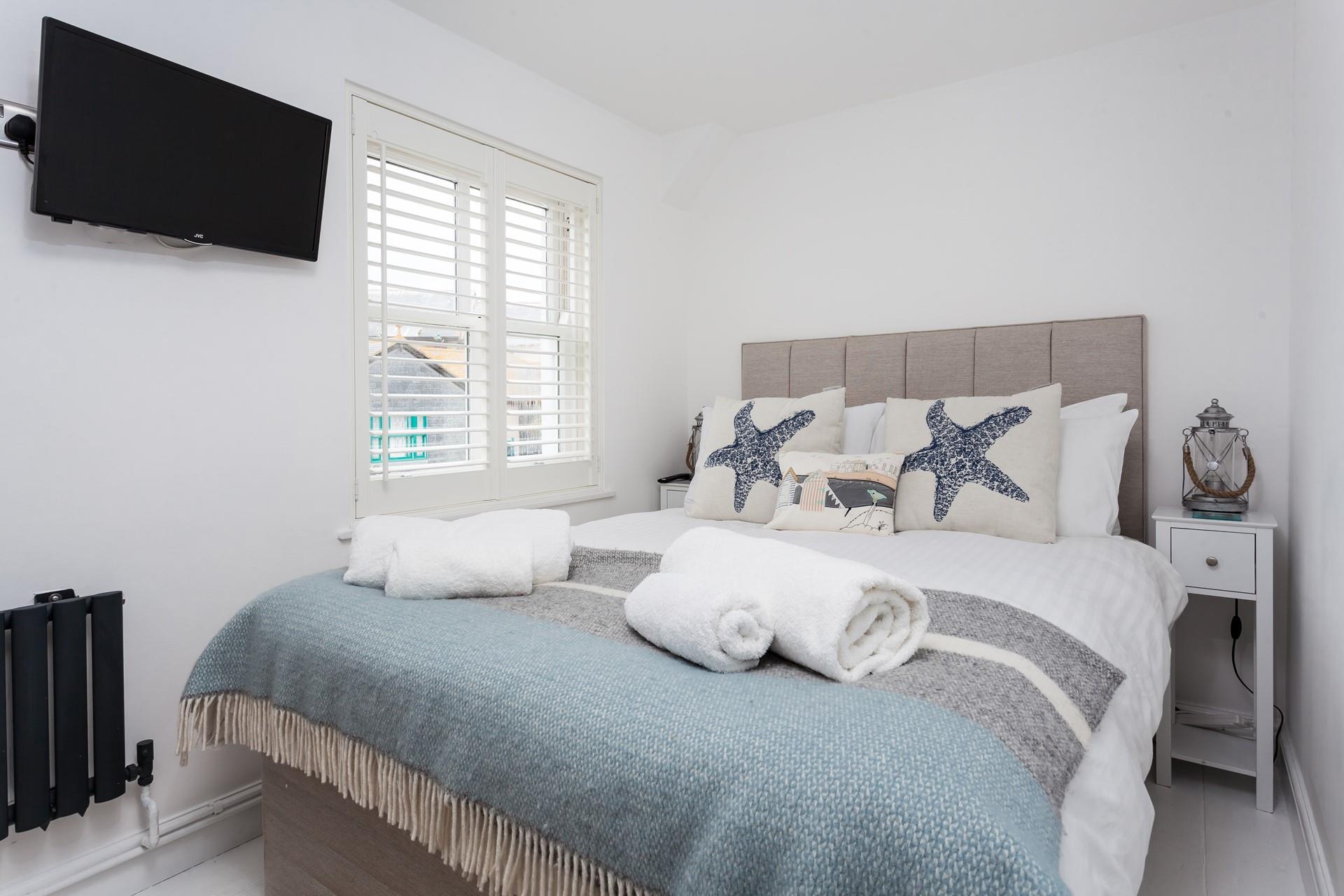 Bedroom 1 offers a sumptuous night's sleep.