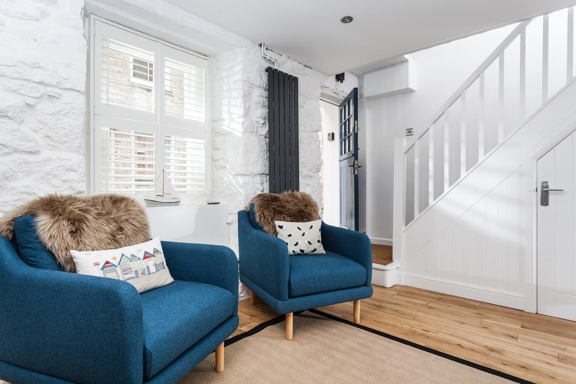 After a wintery walk, cosy up in the sitting room with a hot cup of tea.