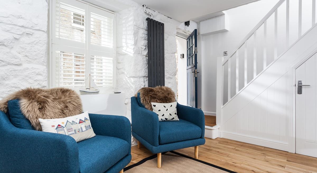 After a wintery walk, cosy up in the sitting room with a hot cup of tea.