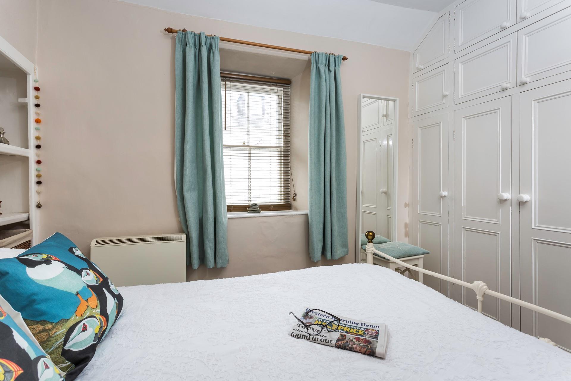 Bedroom 1 also features a large wardrobe for you to unpack all your clothes.