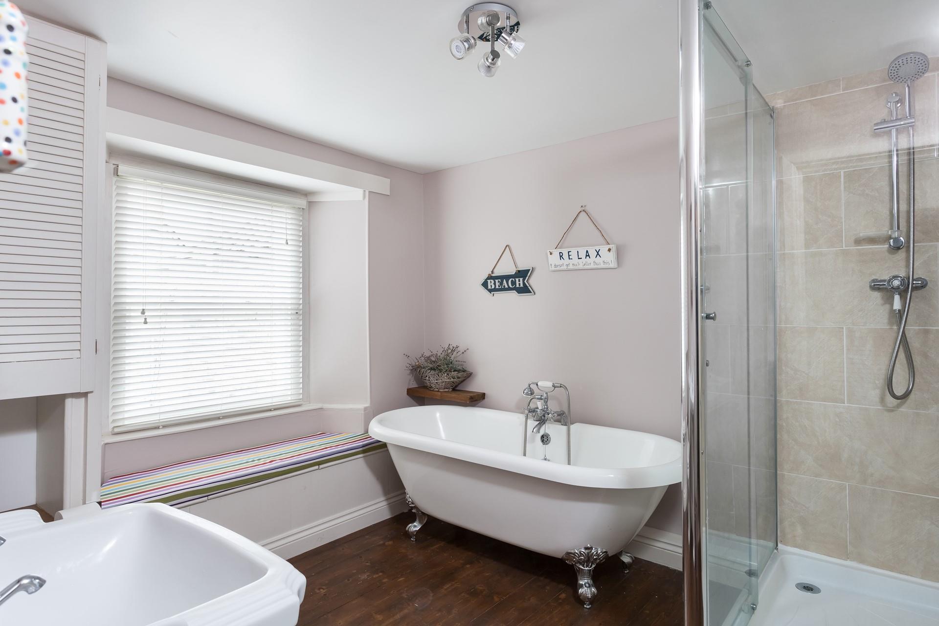 The bathroom is an elegant space to pamper.