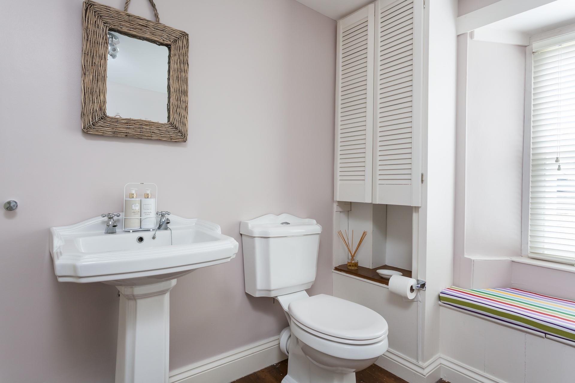 Get ready for the day in the spacious bathroom.