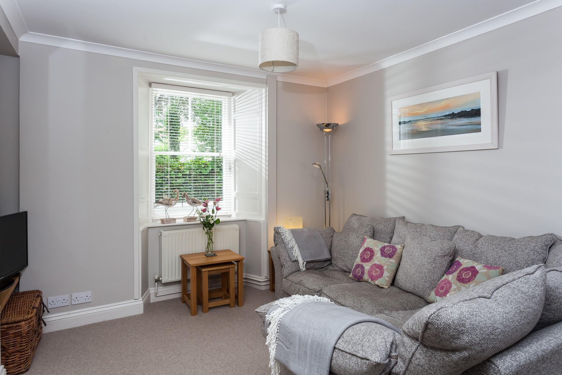 Sink into the soft furnishings for a cosy evening.