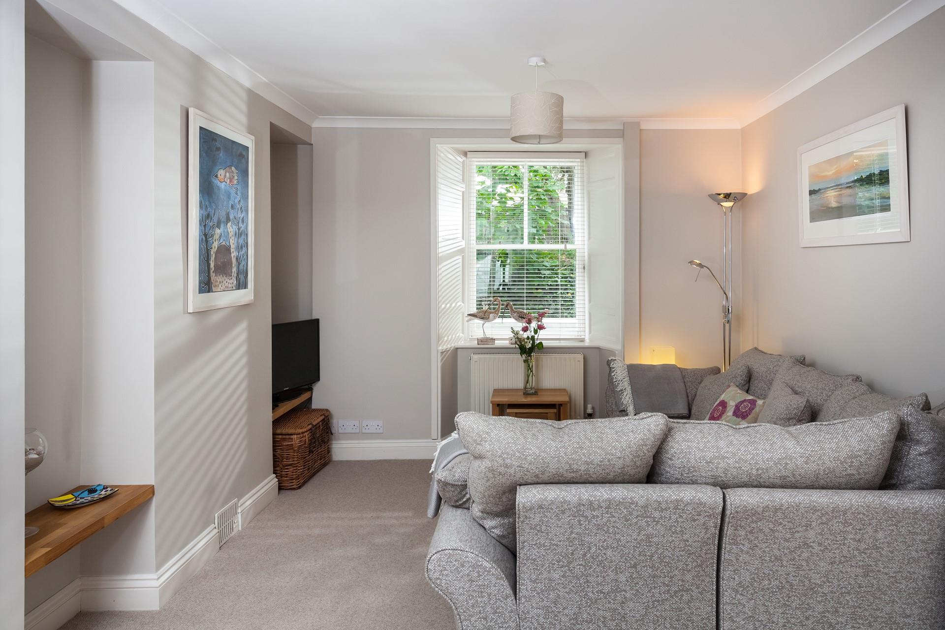 Cosy up on the sofas in Hideaway House.