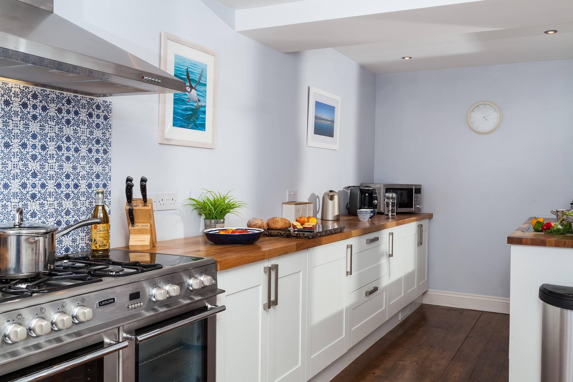 Rustle up a delicious meal in the fully equipped kitchen.