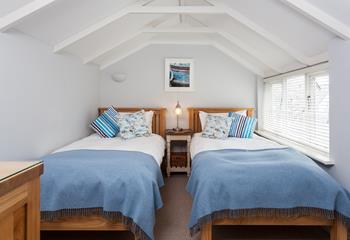 Twin beds are perfect for adults or children to tuck into bed each night.
