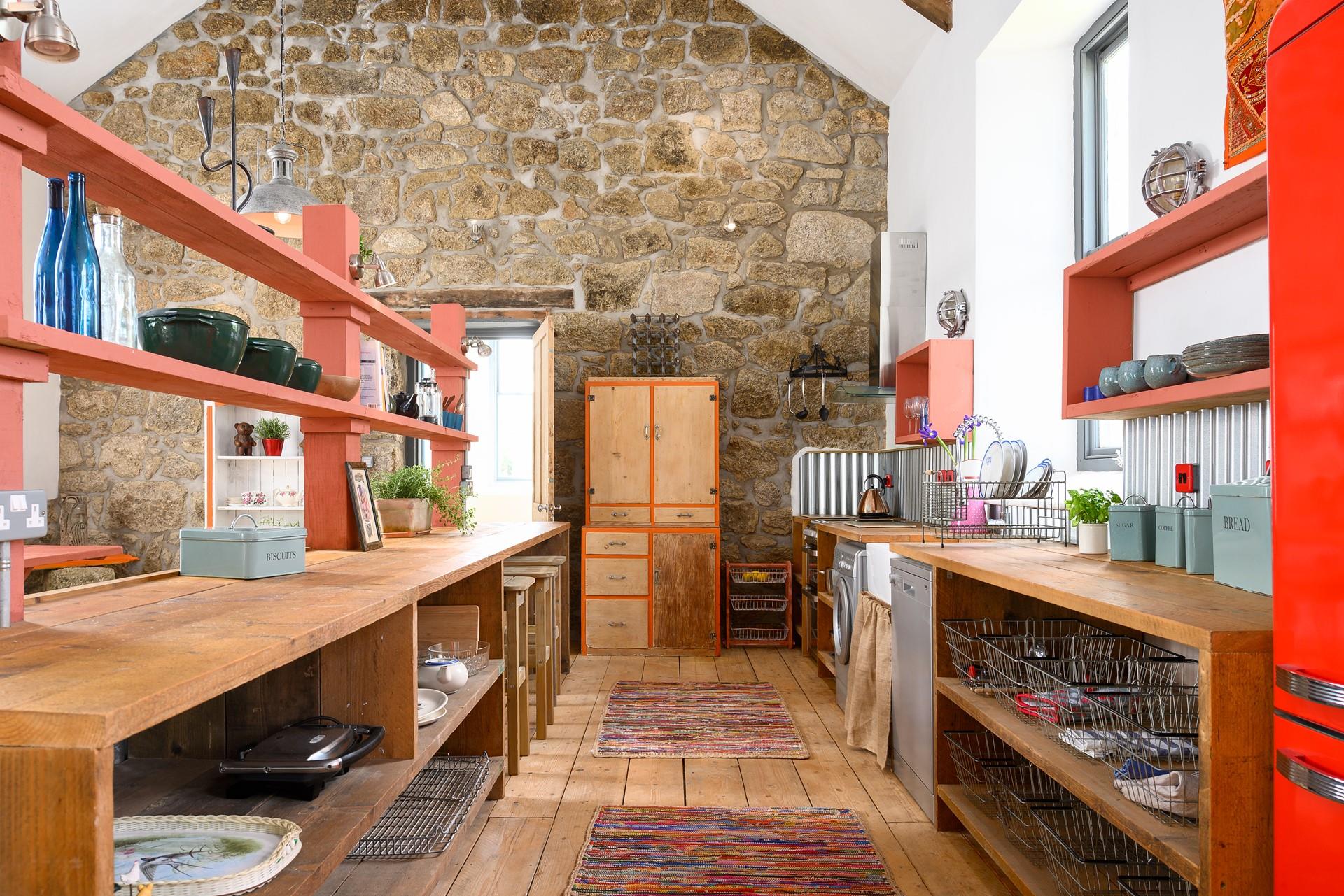 The kitchen area is open plan and spacious, perfect for rustling up meals.