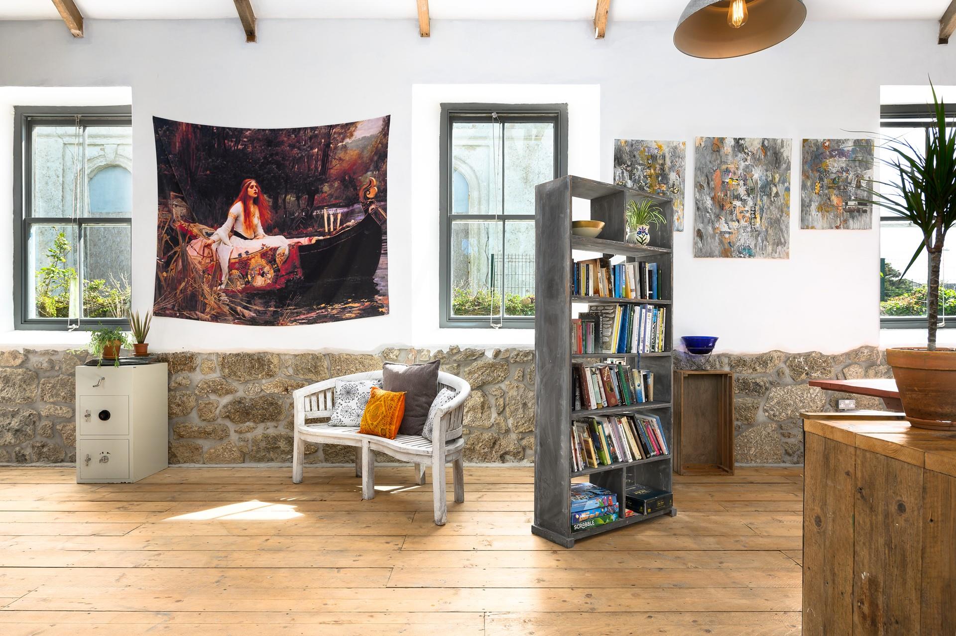 Grab a book and relax in the sitting room.