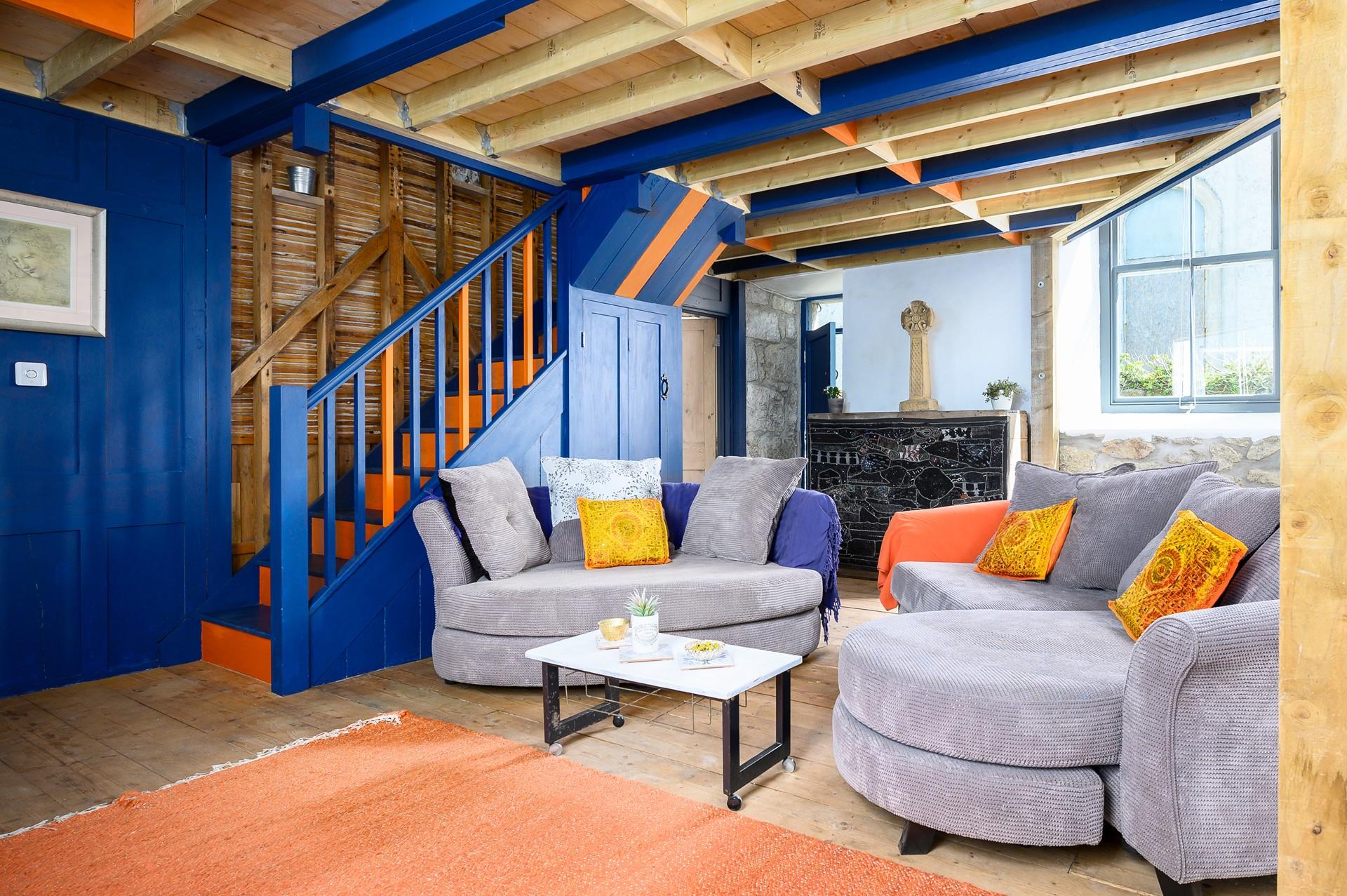 A warm welcome awaits you in the sitting room.