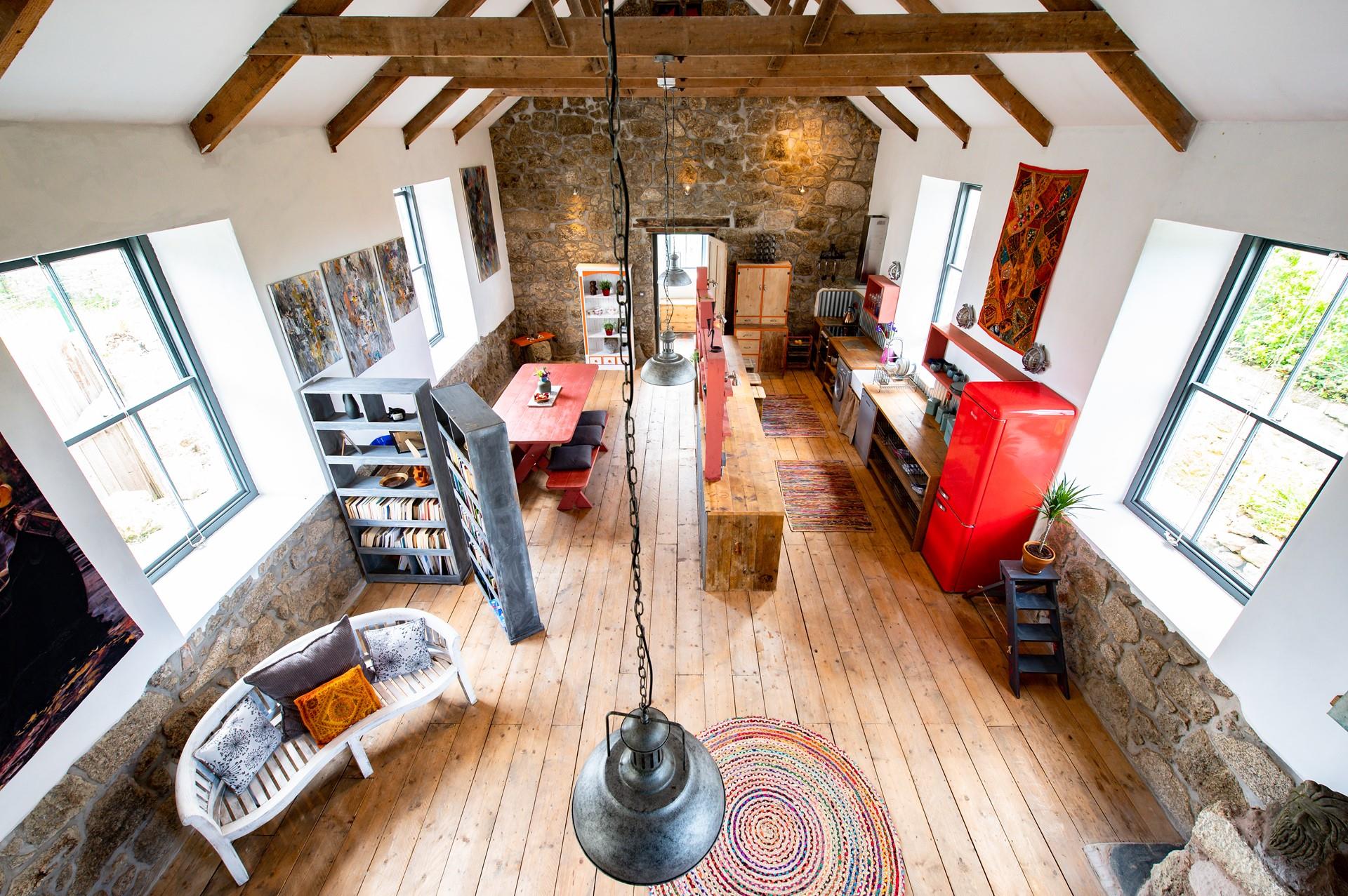 Spend your days on beautiful Porthcurno beach and come back to relax on the mezzanine.