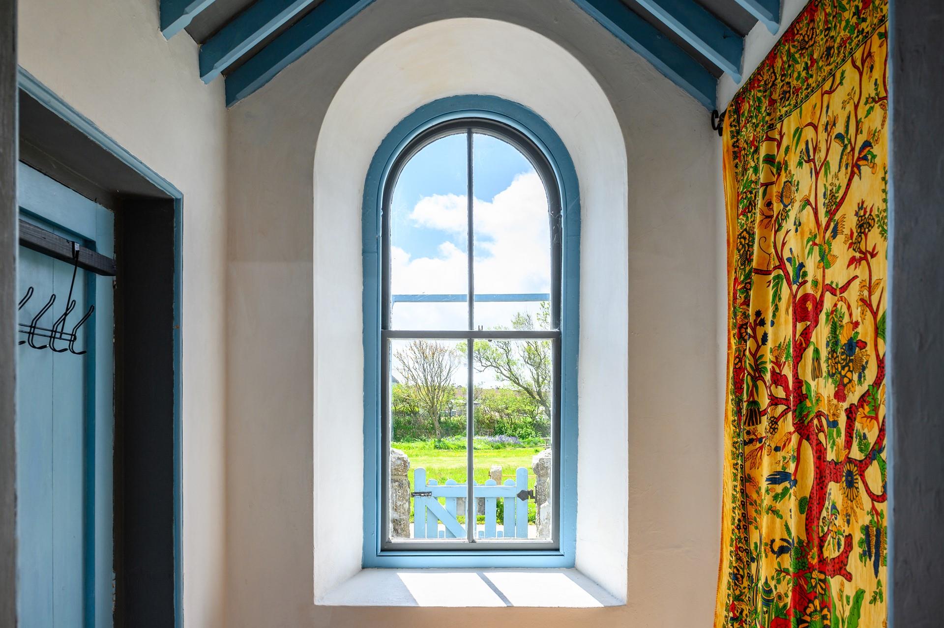 Let the outside flood in through the original Sunday school window. 