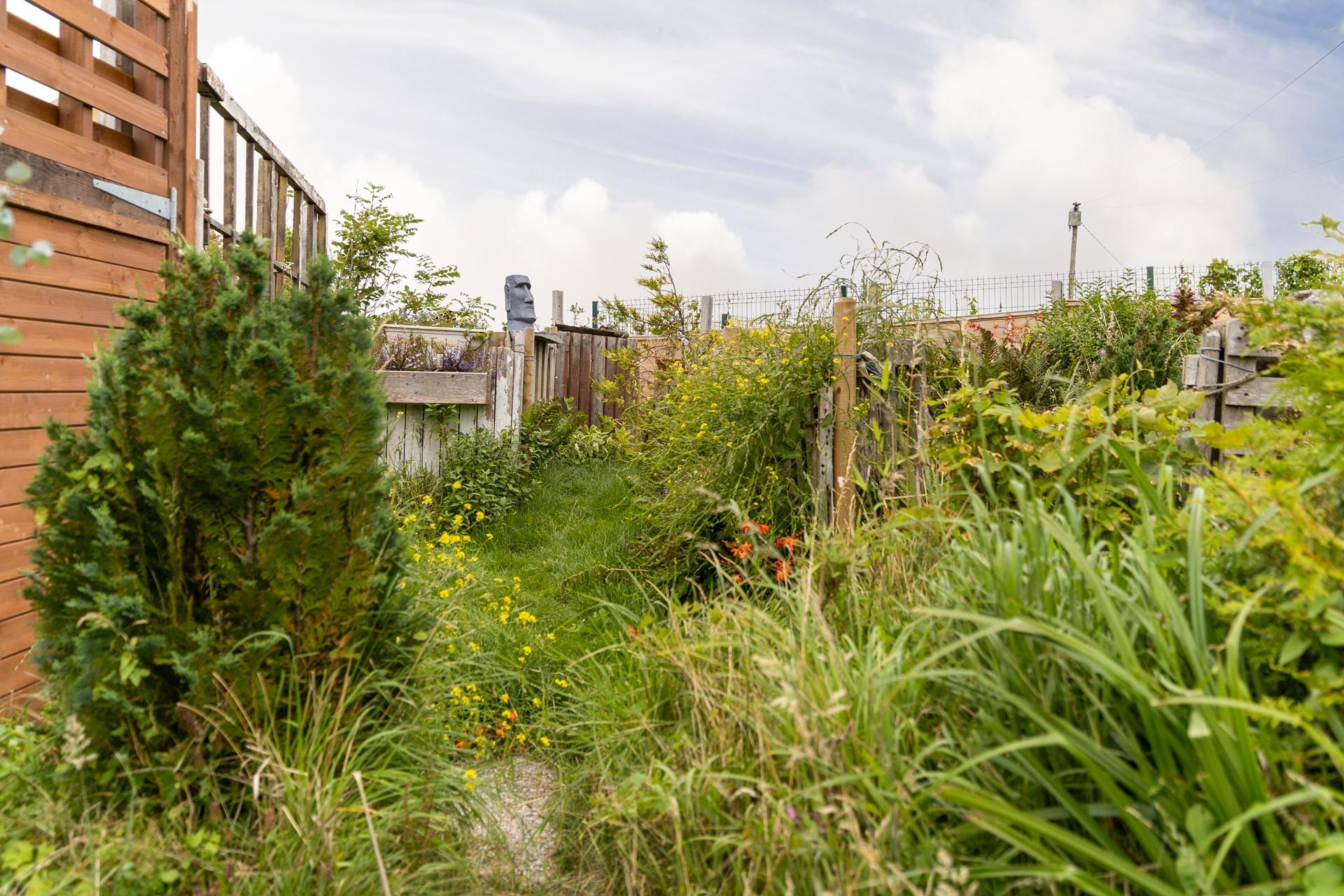 The private gardens surround the property.