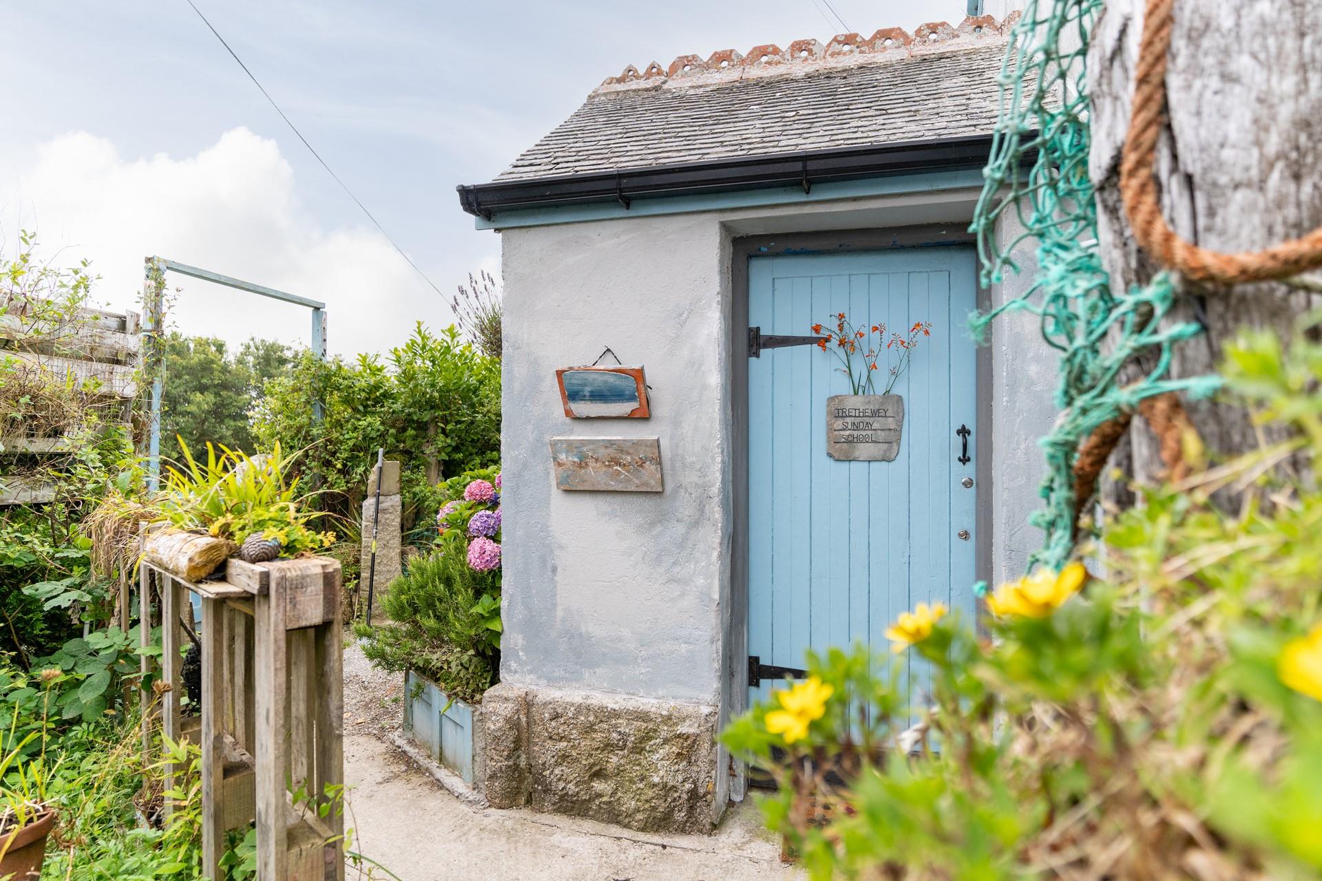 The garden fills with colour and flowers.