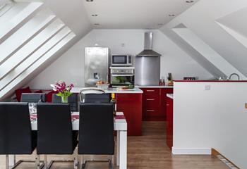 Bright and modern, the kitchen/diner is ideal for preparing and enjoying meals together. 