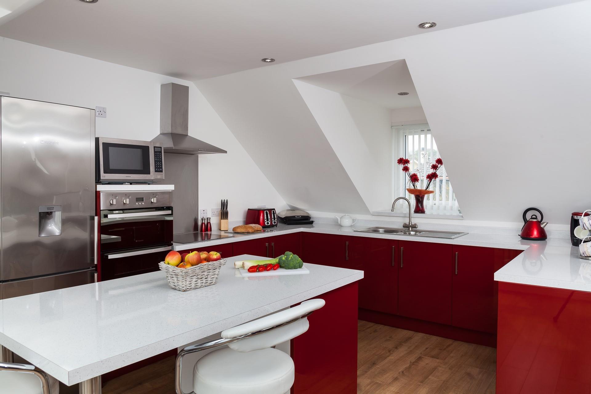 The superbly stylish kitchen is fully equipped with all the essentials and a range of mod-cons. 
