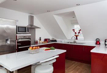 The superbly stylish kitchen is fully equipped with all the essentials and a range of mod-cons. 