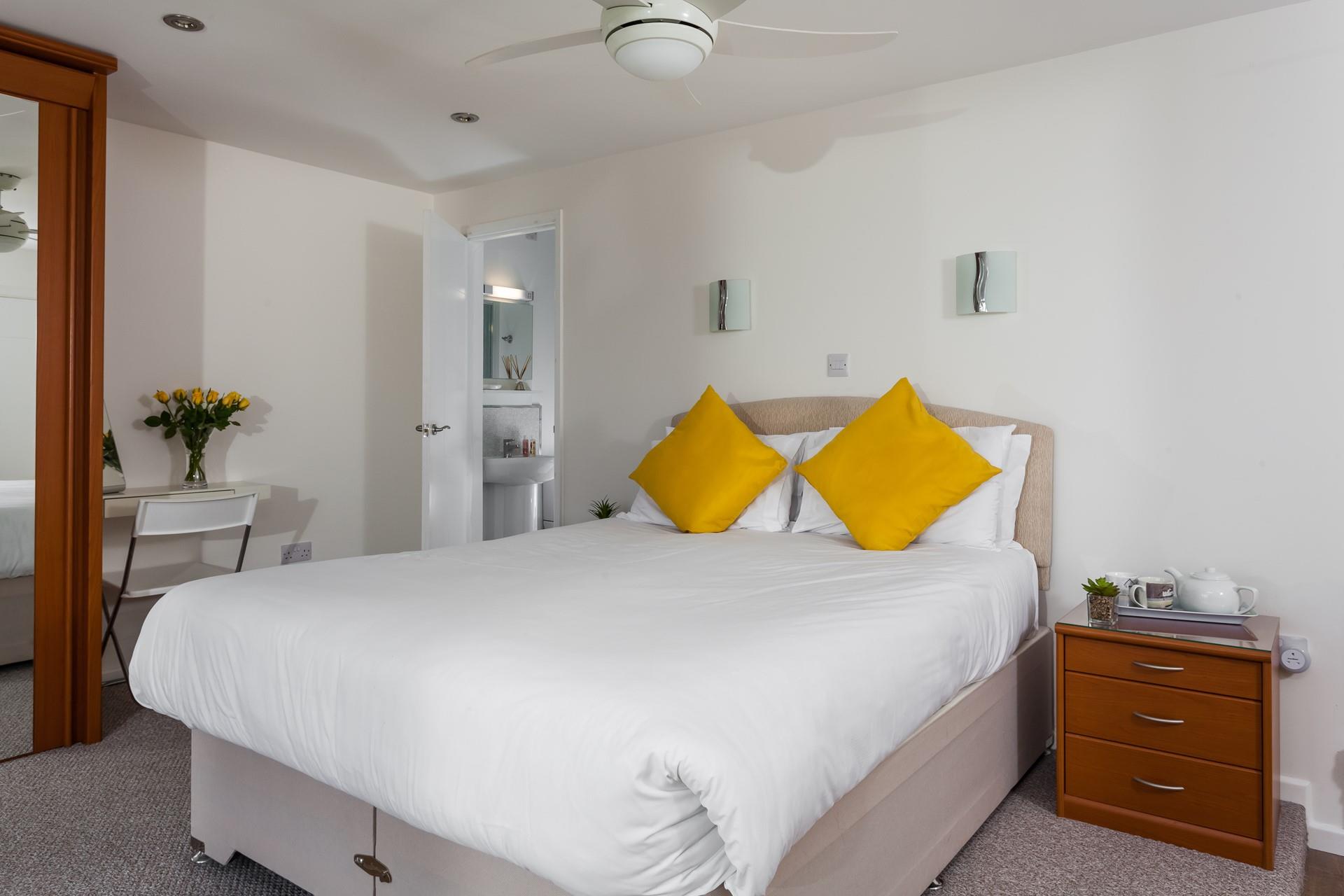 Indulge in the privacy of having an en suite in this comfortable and spacious king size bedroom. 