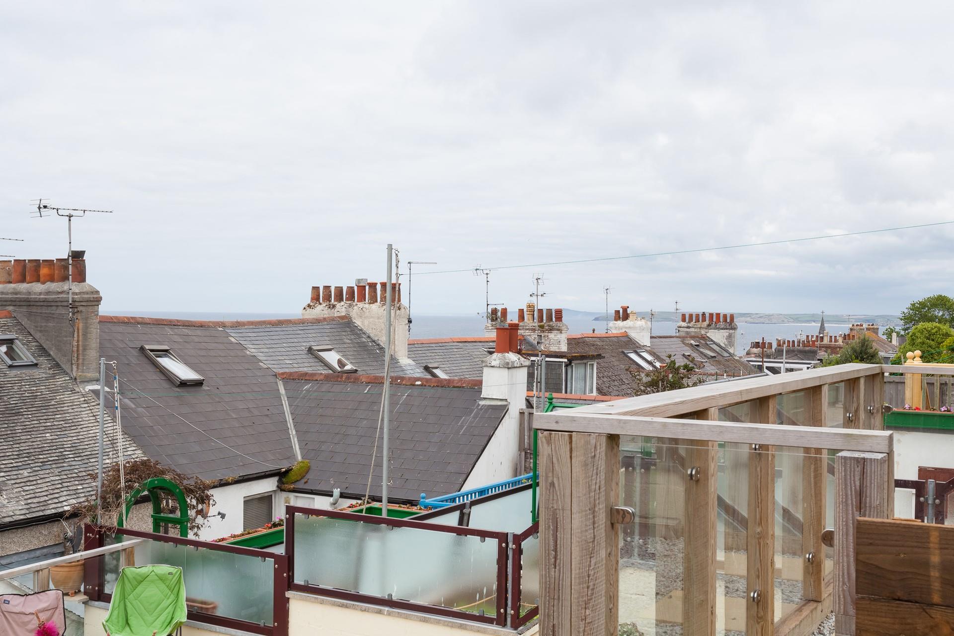 Sea glimpses from the tiered garden.