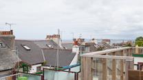 Sea glimpses from the tiered garden.