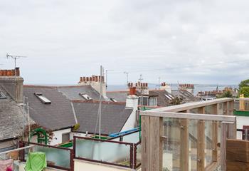 Sea glimpses from the tiered garden.